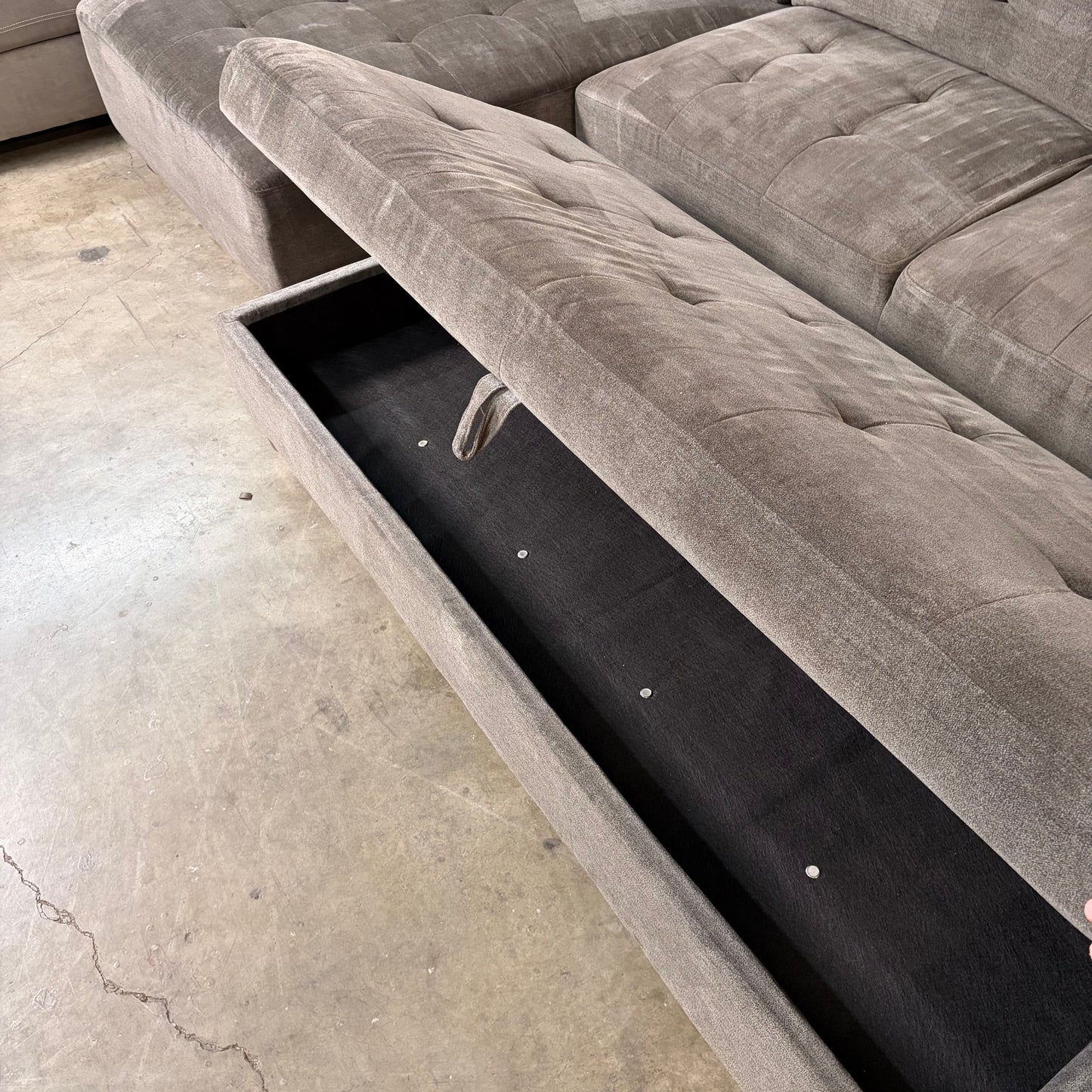 Gray Sectional with Storage Ottoman