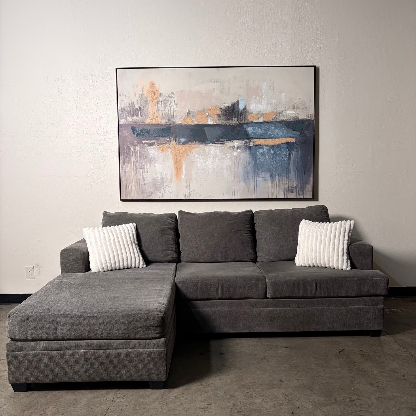 Living Spaces Gray Sectional with Pullout Bed