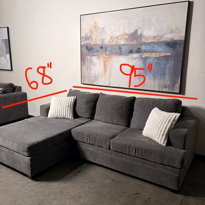 Living Spaces Gray Sectional with Pullout Bed