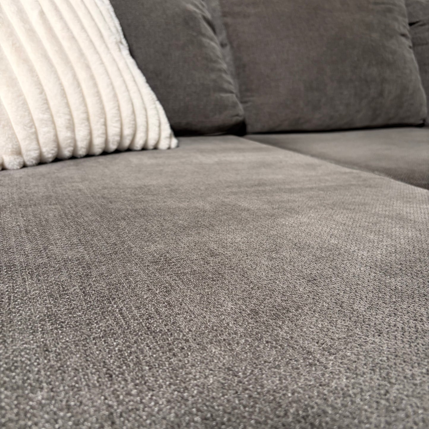 Living Spaces Gray Sectional with Pullout Bed
