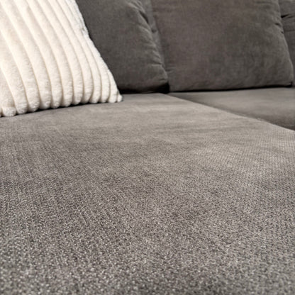 Living Spaces Gray Sectional with Pullout Bed